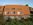 Langeoog Ferienwohnung für 6 Personen (Mittelhaus mit grünem Sichtschutz)